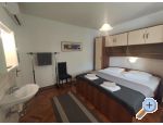 Apartmaji uvala Vardoa - ostrov Rab Hrvaka